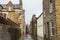 Houses in Stromness, Orkney in Scotland with a cloudy gray sky in the background