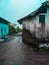 The houses and torrential rains in the village, India