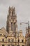 Houses and the tower of Saint John the Baptist church in Arras, France