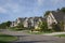 Houses on upscale suburban street in morning sunlight