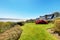 Houses with water view and spring landscape.