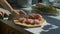 Housewife Hands Cut Meat into Cubes on Wooden Desk