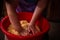 Housewife kneading the dough by hand. preparation of the recipe for traditional Romanian homemade cakes known as cozonac