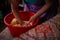 Housewife kneading the dough by hand. preparation of the recipe for traditional Romanian homemade cakes known as cozonac