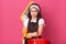 Housewife with mop on her shoulder and red bucket in hands, cleaning lady with dark hair and brown apron, doing housework isolated