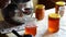 Housewife pours homemade jam in jar