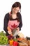 Housewife preparing lunch and cutting carrot