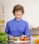 Housewife preparing salad in kitchen for dinner