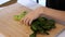 A housewife preparing spinach for dinner