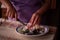 Housewife slicing Turkish delicacies into small cubes on a plate