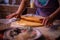 The housewife spreading the dough with a rolling pin. preparation of homemade cakes