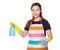 Housewife using rag and detergent spray