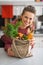 Housewife with vegetables from local market