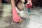 Housework and housekeeping concept. Woman cleaning floor with mo