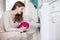 Housework young woman doing laundry