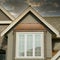 Housing Market Custom Home Copper Roof Stucco Siding Stormy Sky Background