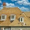 Housing Market Custom Home New Cedar Shake Roof Summer Sky Background