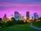 Houston Texas modern skyline at sunset twilight from park