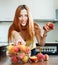 Houswife taking peaches at domestic kitchen