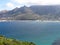 Hout Bay harbour beneath the mountains.