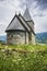 Hove church, an old stone church in Vikoyri, Norway, during a moody, dramtic day