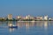 A hovercraft glides along the Amur River. View from the embankment of the city of Blagoveshchensk, Russia