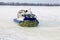 Hovercraft transporter on the ice of river in winter day