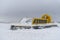 Hovercraft in winter tundra. Air cushion on the beach. Yellow hover craft under snow