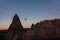 hovering hot air balloon over the mountains