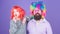 How crazy is your father. Man bearded father and girl wear colorful wig while eat lollipop candy. Thing loving father do