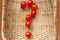 How to grow cherry tomatoes at home? What good is a tomato? How to choose a tomato? Small red cherry tomatoes spill out of a wicke