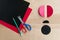 How to make cardboard colourful ladybird DIY. Homemade craft with ladybug tutorial. Glue, paper, scissors and pencil on a wooden