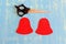 How to make a Christmas bell decor. Step. Cut felt parts to create a Christmas tree decor. Red felt bell patterns