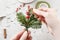 How to make christmas decorations with fir, red berries and simple iron lantern