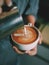 How to make coffee latte art by barista in vintage color tone