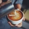 How to make coffee latte art by barista in vintage color tone