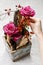 How to make floral arrangement with roses and bark in vintage po
