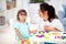How to save healthy eyesight. Mom and daughter make glasses from plasticine