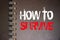How to survive words on page of copybook. Survival concept. Crisis management business concept. Coronavirus prevention concept