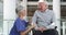 How are you doing. 4k video footage of a mature female nurse talking to a wheelchair-bound senior male patient.