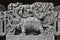 Hoysaleswara Temple wall carved with sculpture of Makara mythical animal carrying lord Varuna god of rain