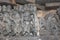 Hoysaleswara Temple Wall carving of a man using telescope