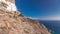 The Hozoviotissa Monastery standing on a rock over the Aegean sea in Amorgos island timelapse hyperlapse, Greece.