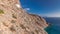 The Hozoviotissa Monastery standing on a rock over the Aegean sea in Amorgos island timelapse hyperlapse, Greece.