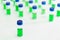 HPLC vials with green sample of plant extracts. Developing of drugs based on natural products. Biochemical analysis