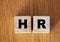 HR abbreviation on wooden blocks. Human Resources career business concept