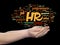 Hr or human resources management abstract word cloud in hand