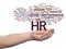 Hr or human resources management abstract word cloud in hand