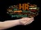 Hr or human resources management abstract word cloud in hand
