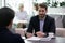 HR manager listen applicant at job interview process